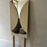 Large round triptych mirror with ivory background and back, 1970s design.