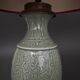 Napoleon III lamp in green cecidon on a brass base