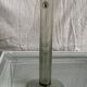 Old transparent soliflore tube vase