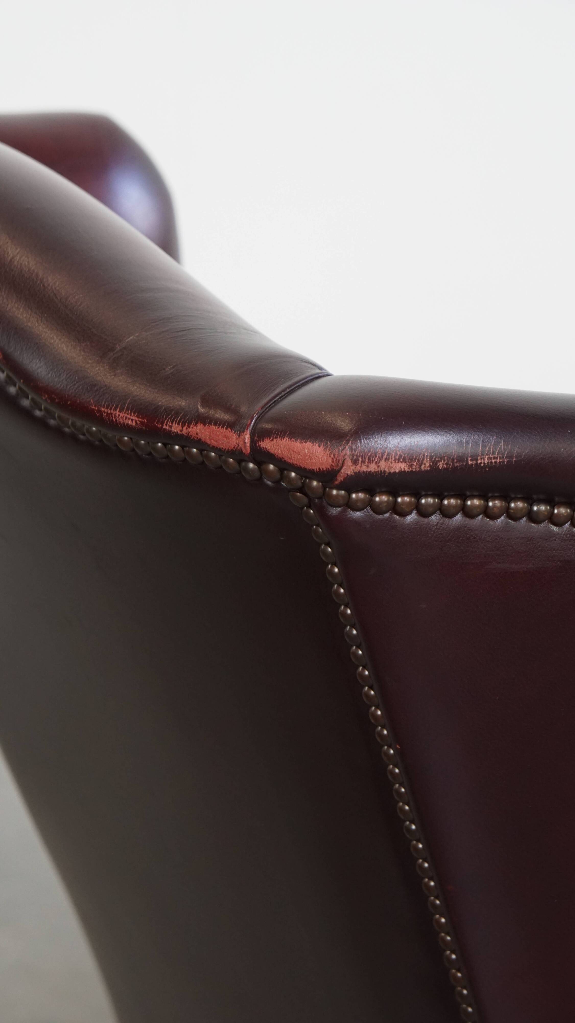 Bordeaux Red Cowhide Wingback Chair in English Style