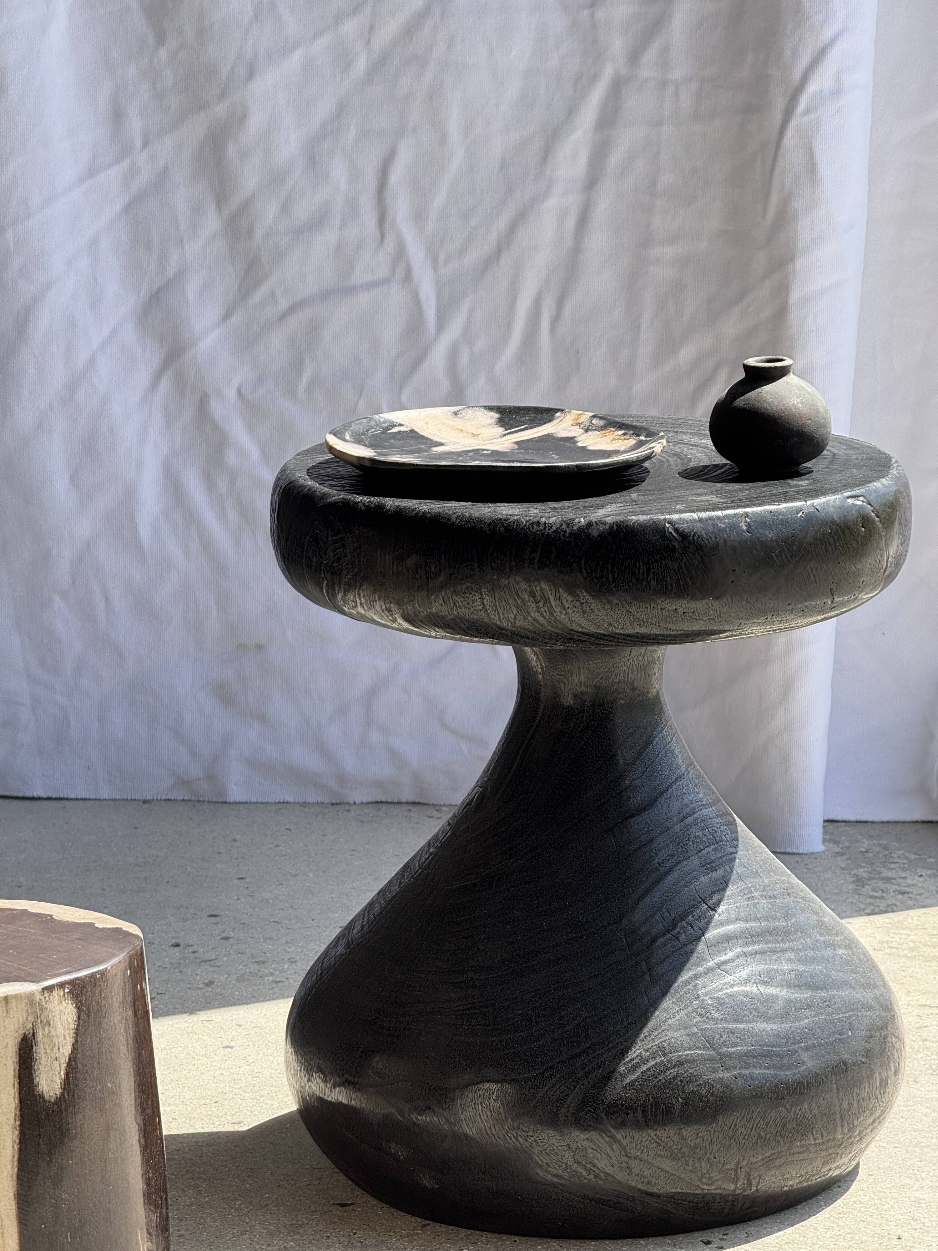 Small side table in black and white petrified wood H28 D18