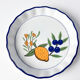 Set of 3 vintage ceramic dishes with wicker baskets.