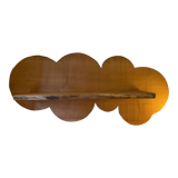 Cloud-shaped shelf made of solid wood