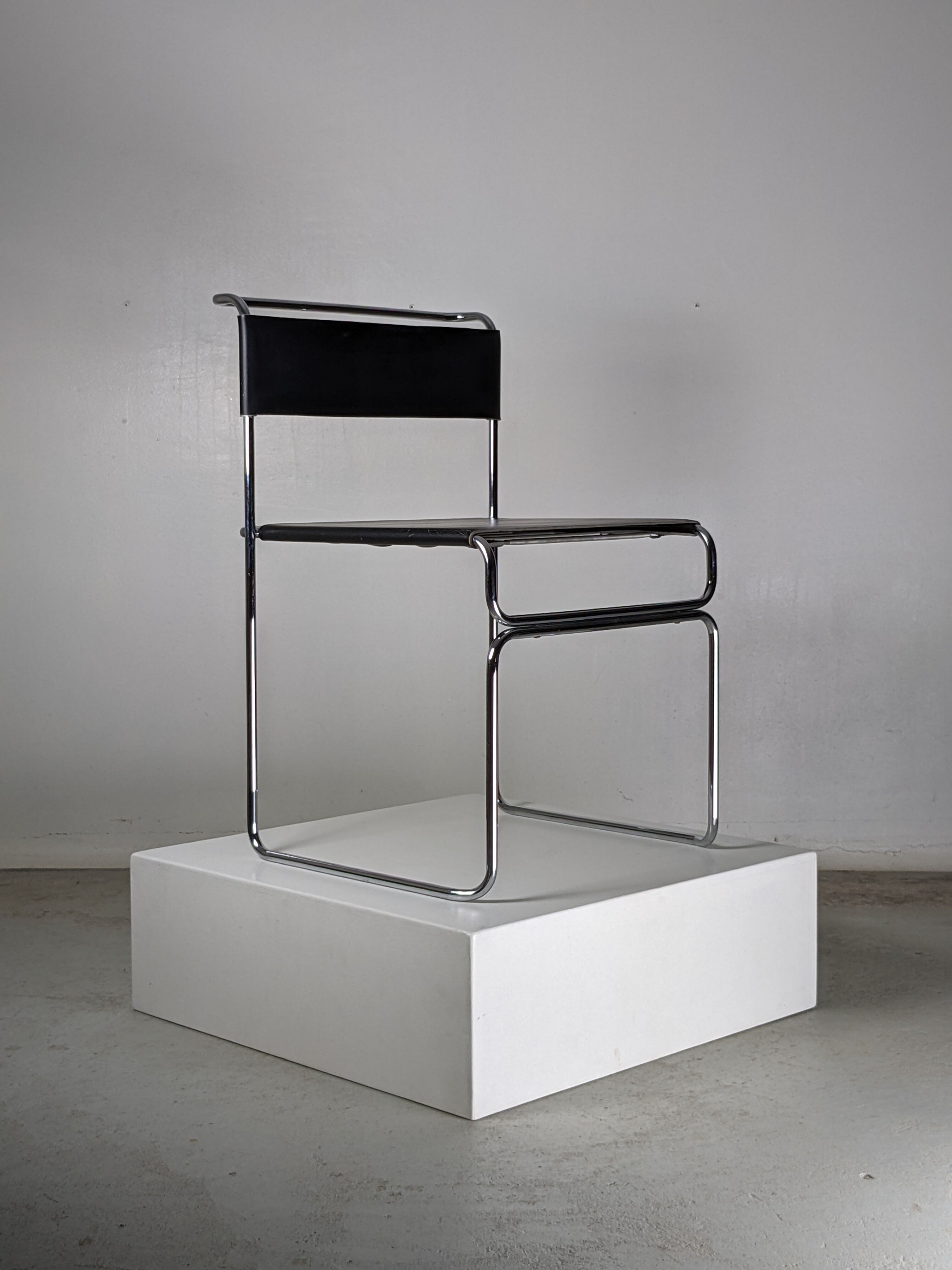 Suite of 4 chairs in chromed metal and leather by Giovanni Carini for Planula - 70s
