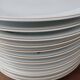 Set of 11 plates, Baudour porcelain