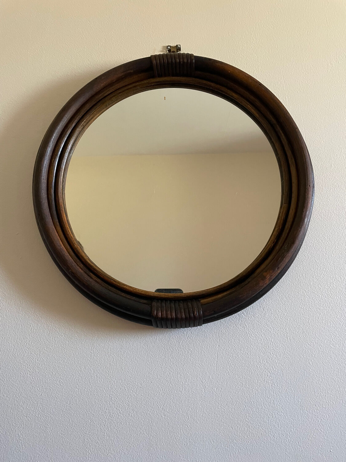 Round rattan mirror