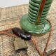 Art Deco table lamp in green ceramic and gold leaf from the 50s