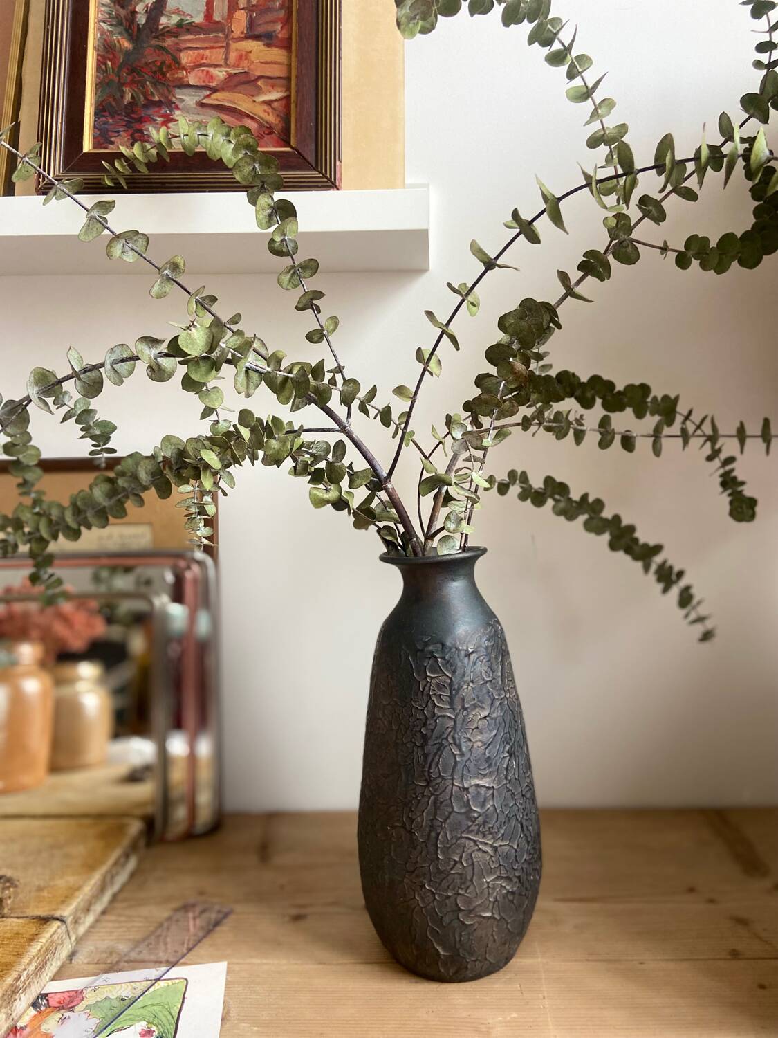 Black ceramic pitcher from the 50s