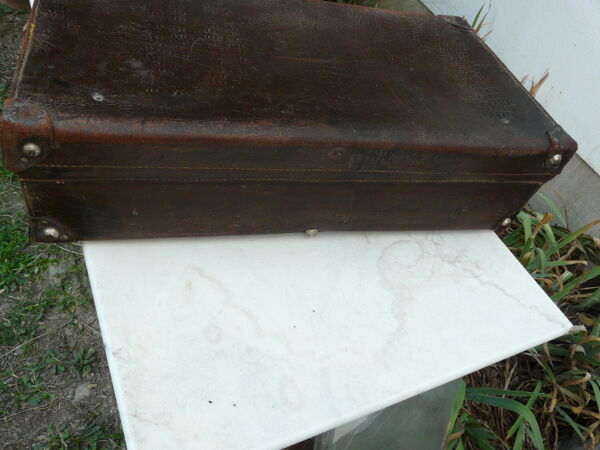 Valise en cuir marron intérieur tissu