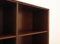 Danish mahogany veneered shelving unit on splayed legs, 1960s