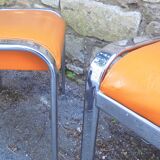 Pair of chrome and faux orange vintage stools "70"