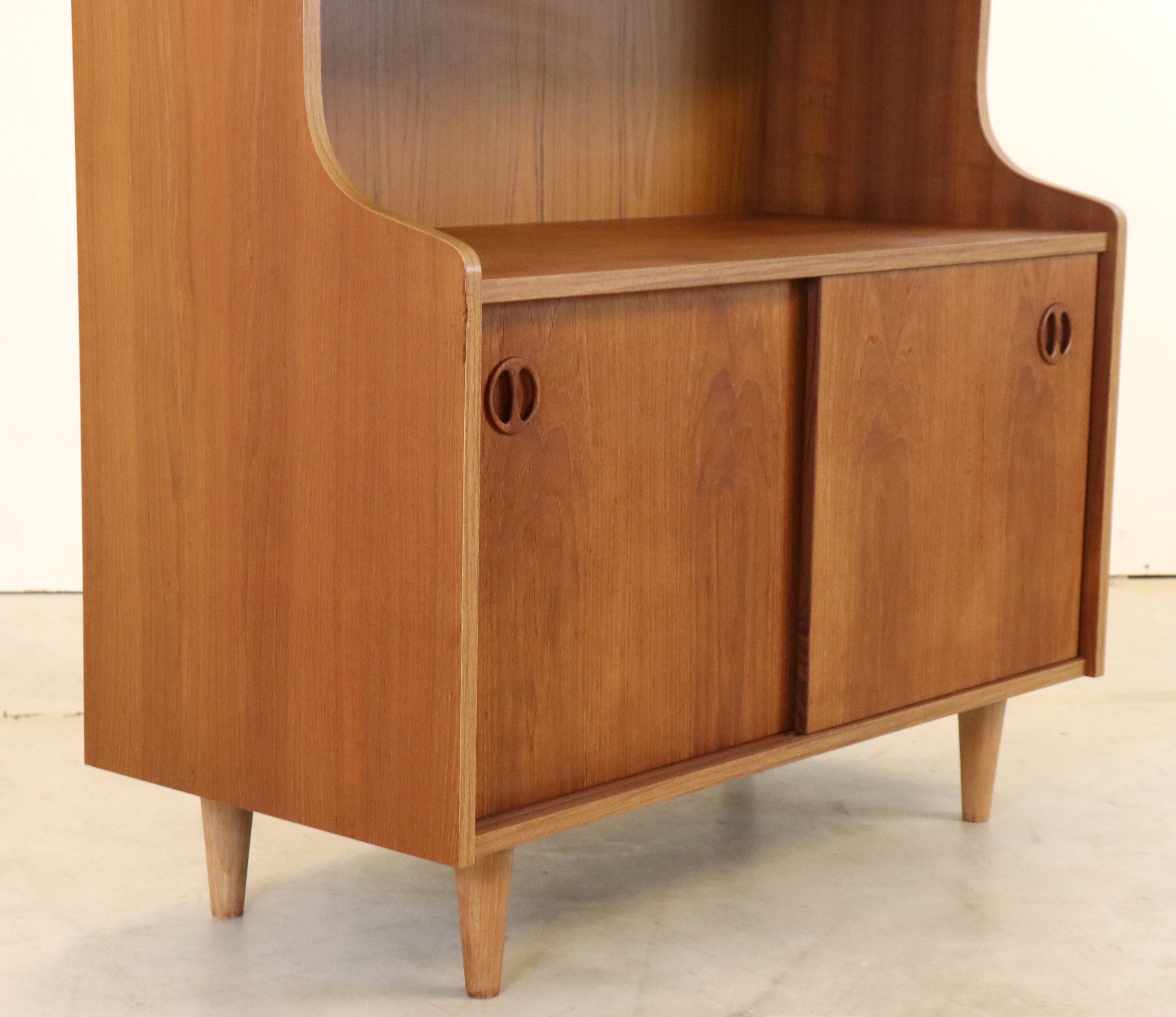 vintage bookcase with full on storage space.