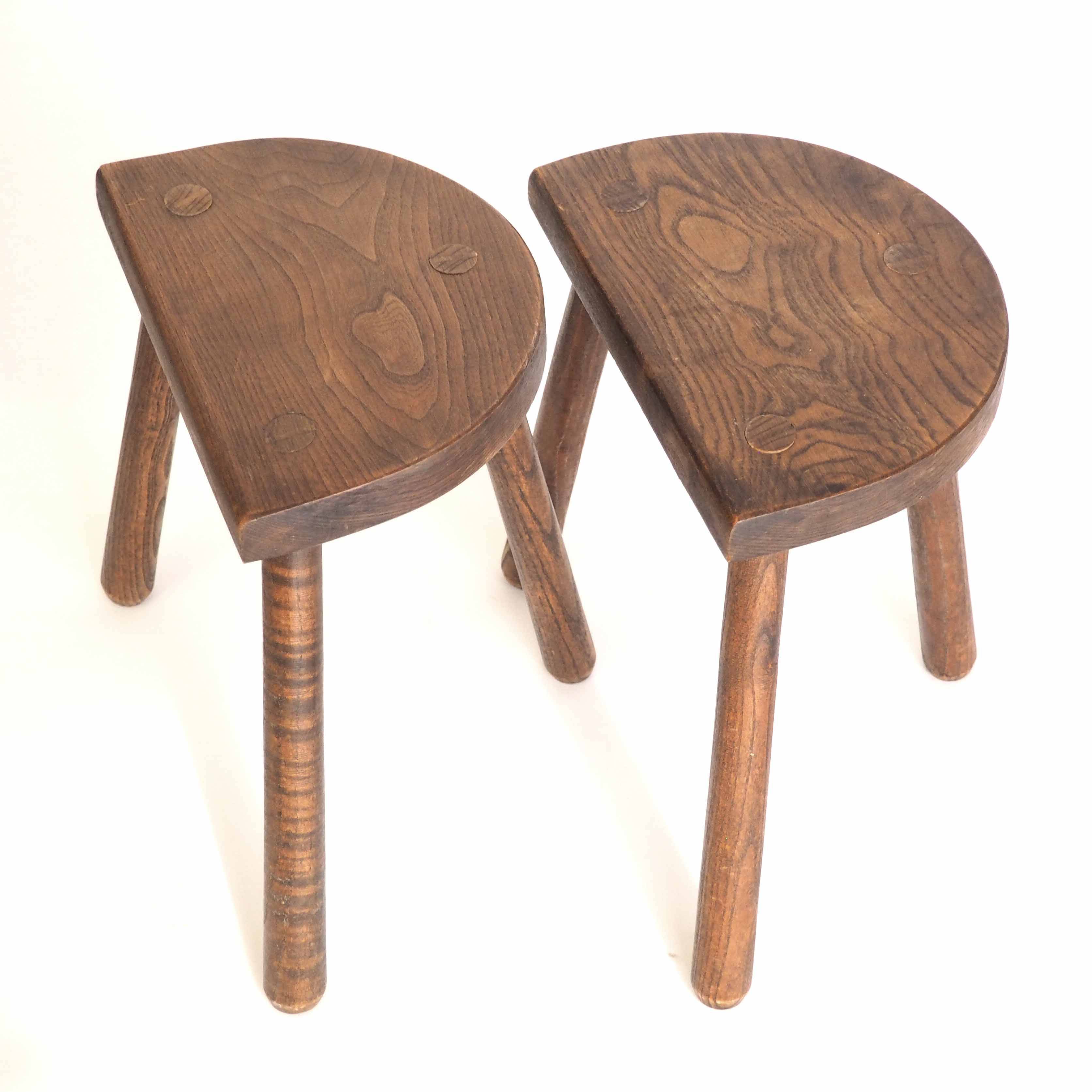 Pair of tripod cowherd stools