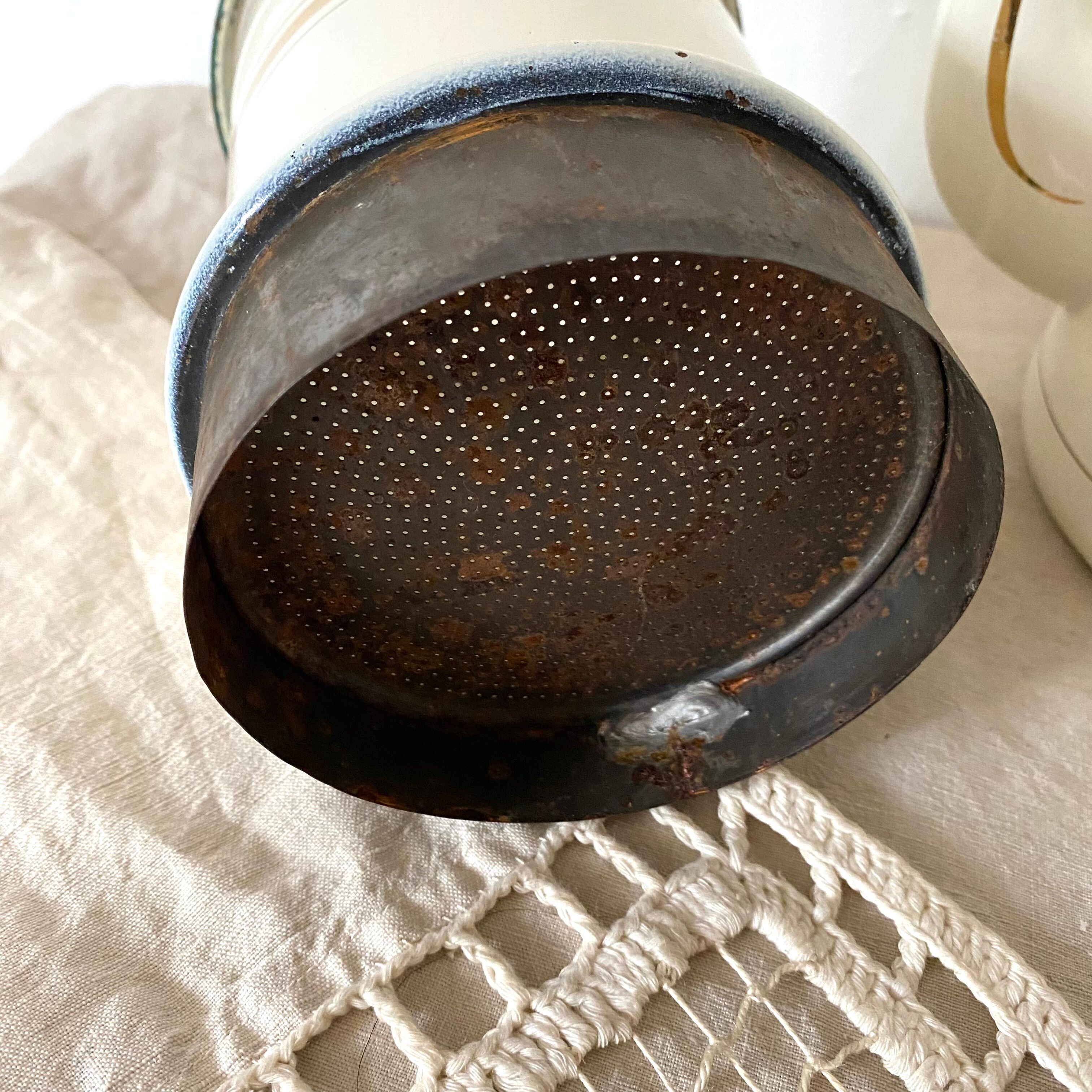 Antique coffee maker in enamelled sheet metal