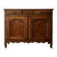 Old low sideboard in solid wood with drawers and doors.