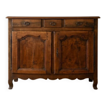 Old low buffet in solid wood with drawers and doors.