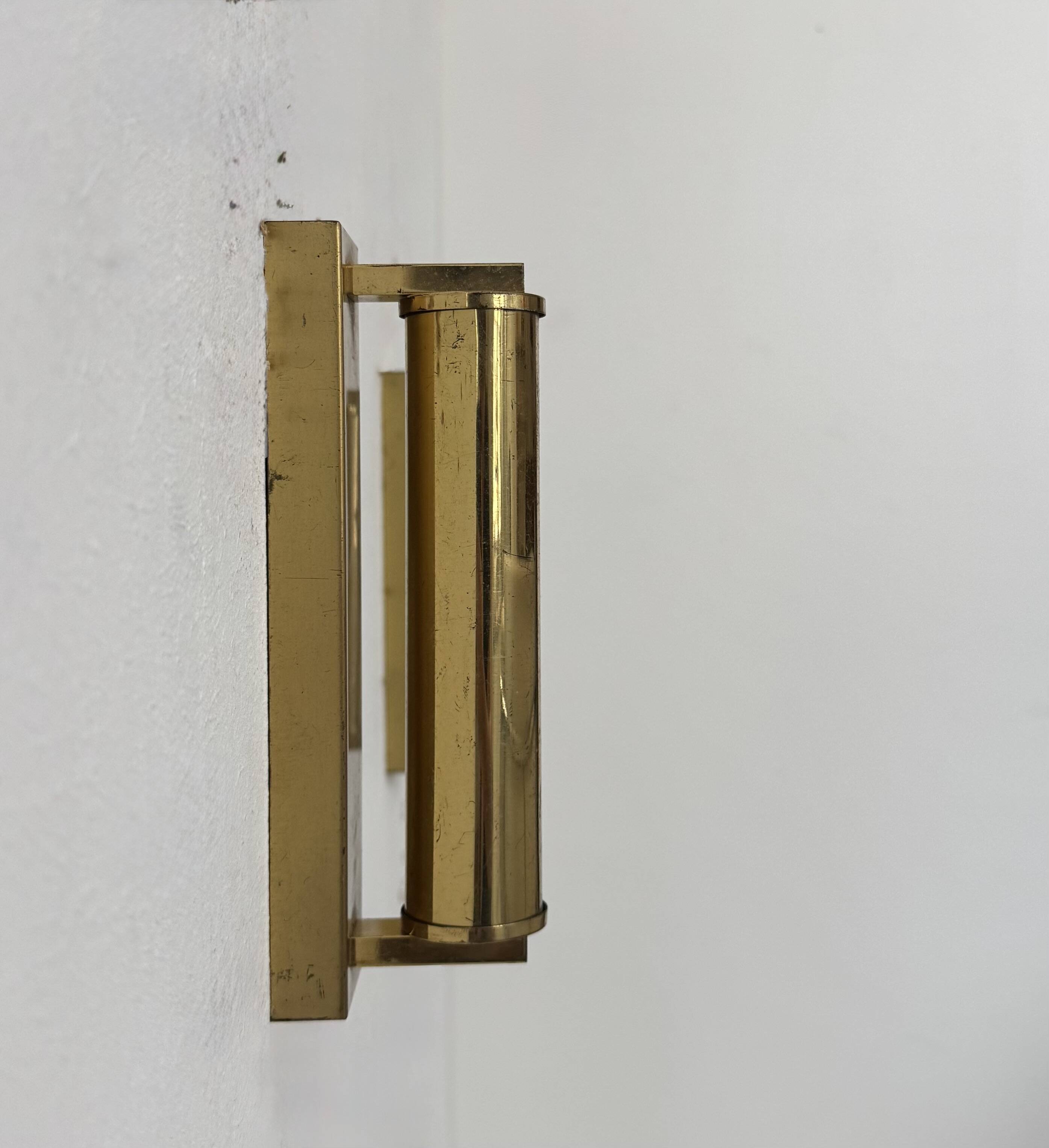 Pair of vintage modernist adjustable wall lights, brass, France 1970.