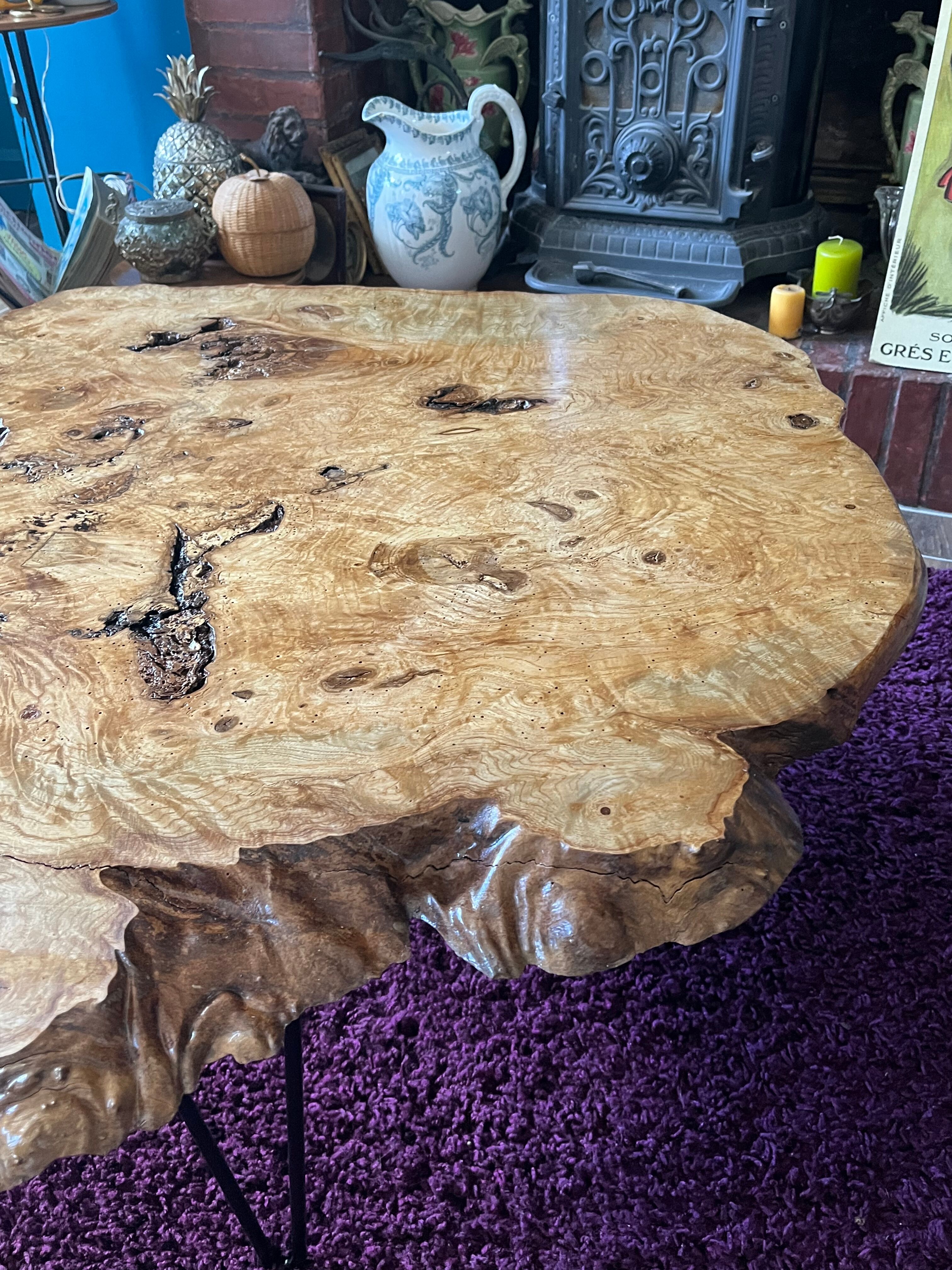 Tripod coffee table in natural solid elm magnifying glass