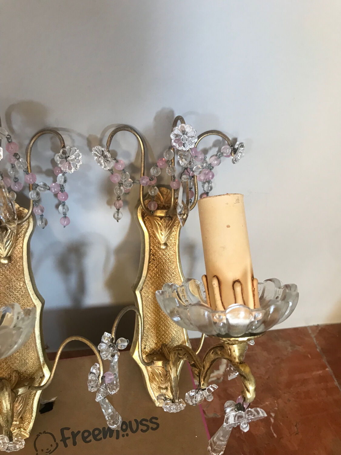 Pair of glass wall sconces with crystal drops