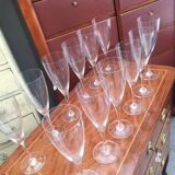 Service of 12 Baccarat champagne flutes.