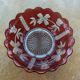Red and transparent glass bowl with floral motifs and vintage wheat cobs