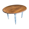 Oval table with removable flap