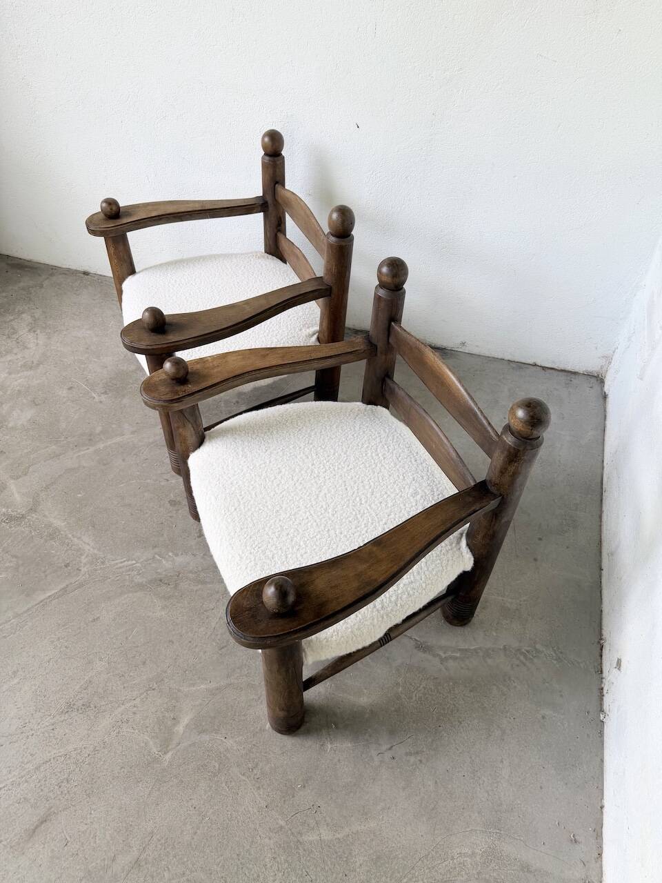 Pair of Dudouyt armchairs from the 1950s, oak.