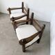 Pair of Dudouyt armchairs from the 1950s, oak.