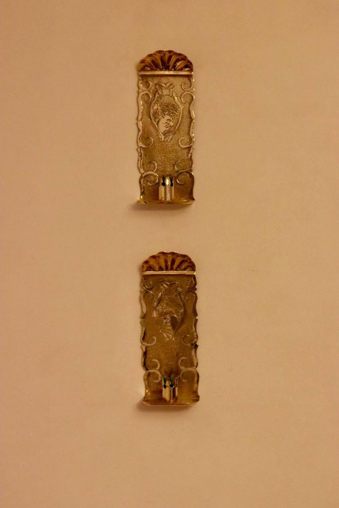 A pair of Swedish brass wall sconces from the mid-century.