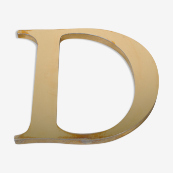 Letter sign in gold metal "D" 1980