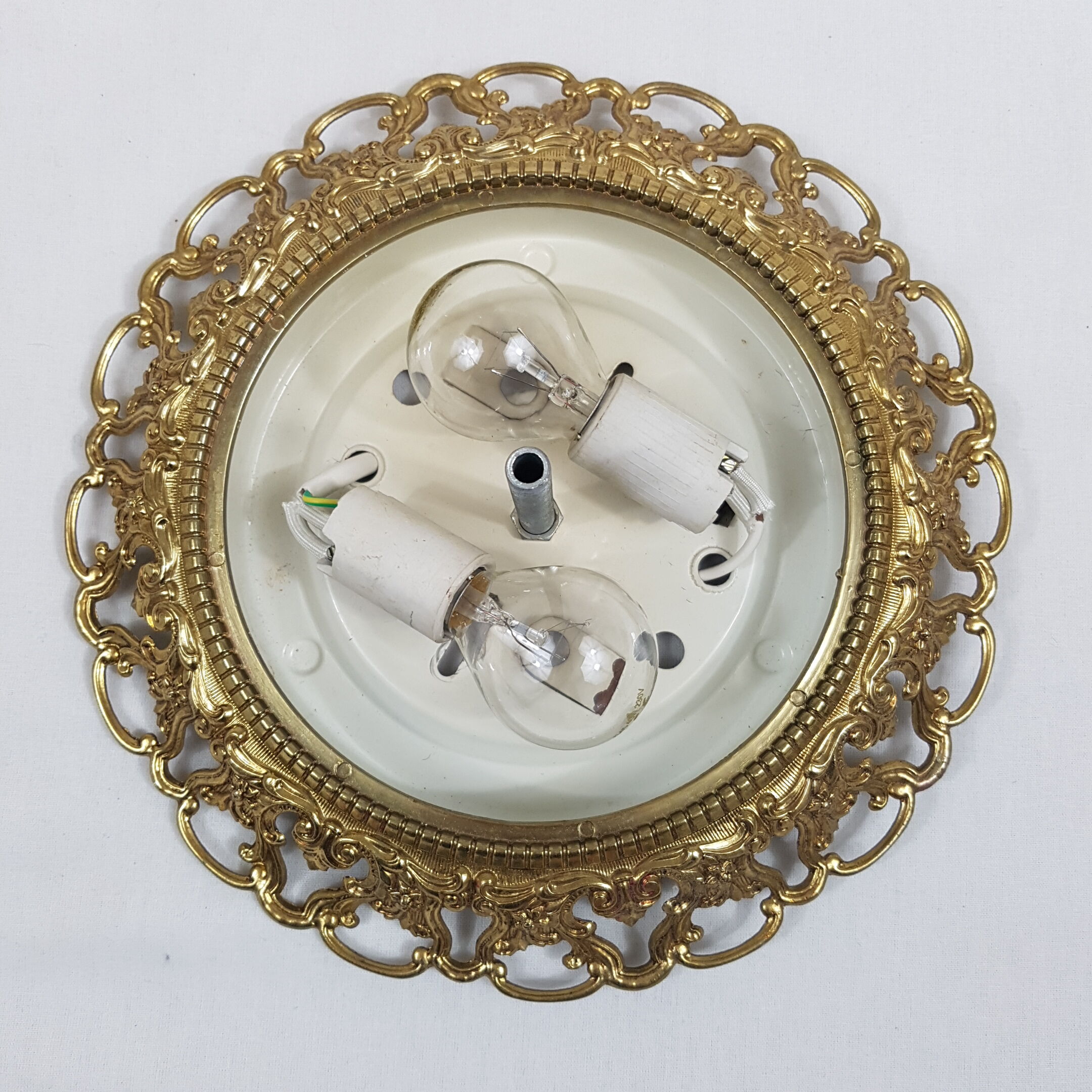 Golden mount and glass globe ceiling light