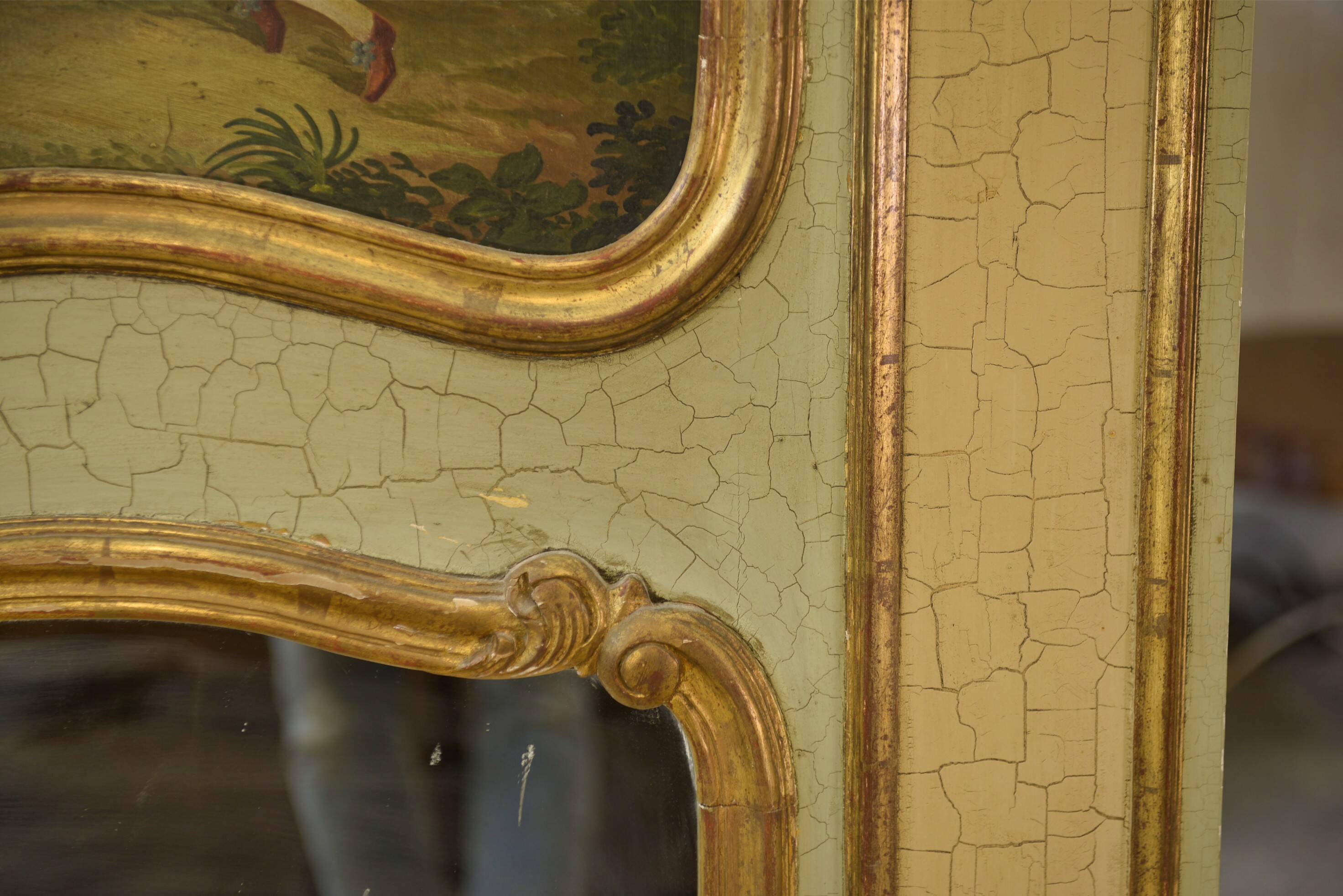 Trumeau mirror with cracked patina and oil on panel depicting a romantic scene from the 19th century.