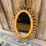Vintage oval rattan mirror from the 60s/70s.