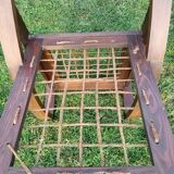 A pair of vintage rope and wood armchairs