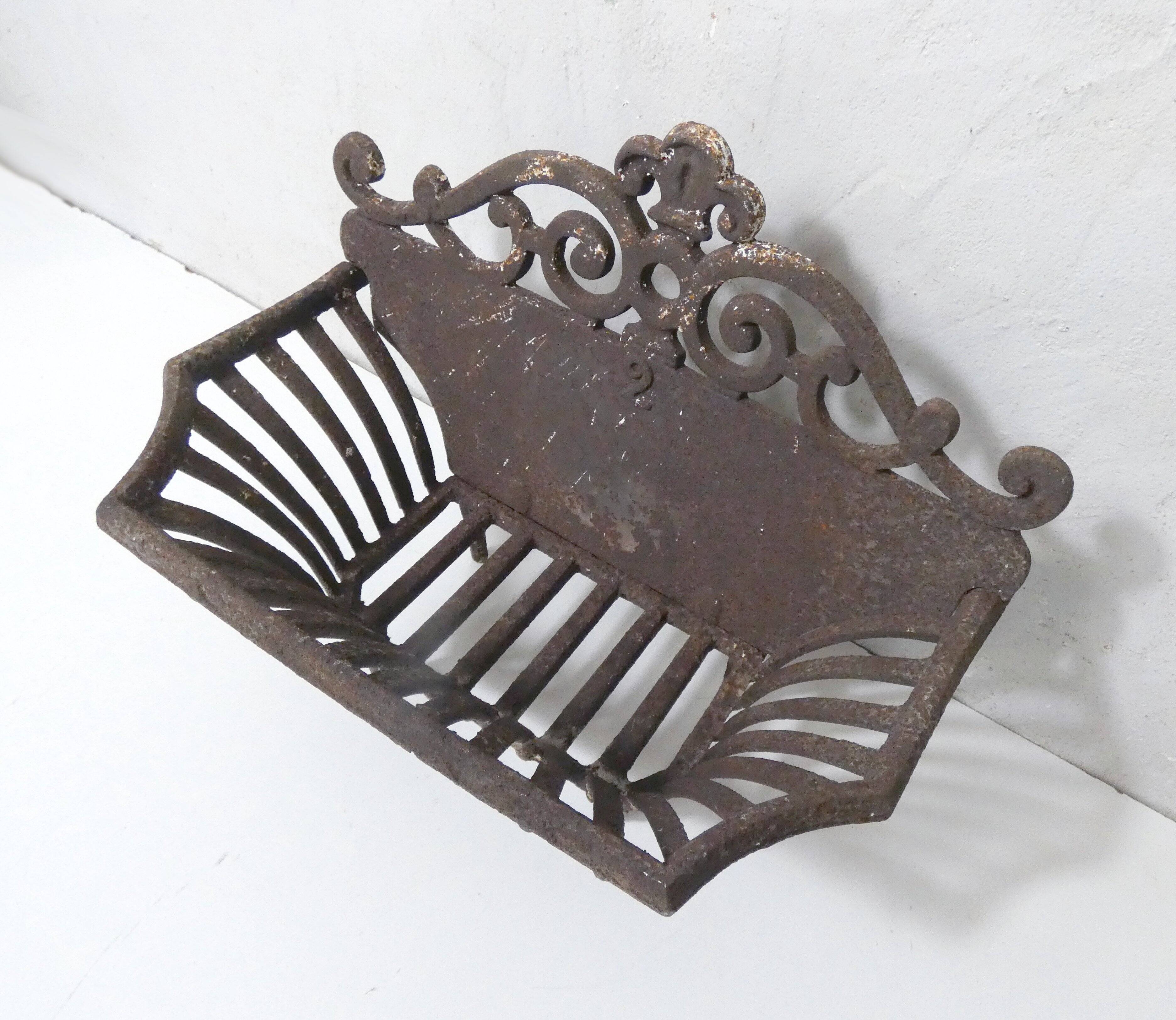 vintage cast iron log holder