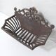 vintage cast iron log holder