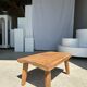 Coffee table in blond teak quadripod