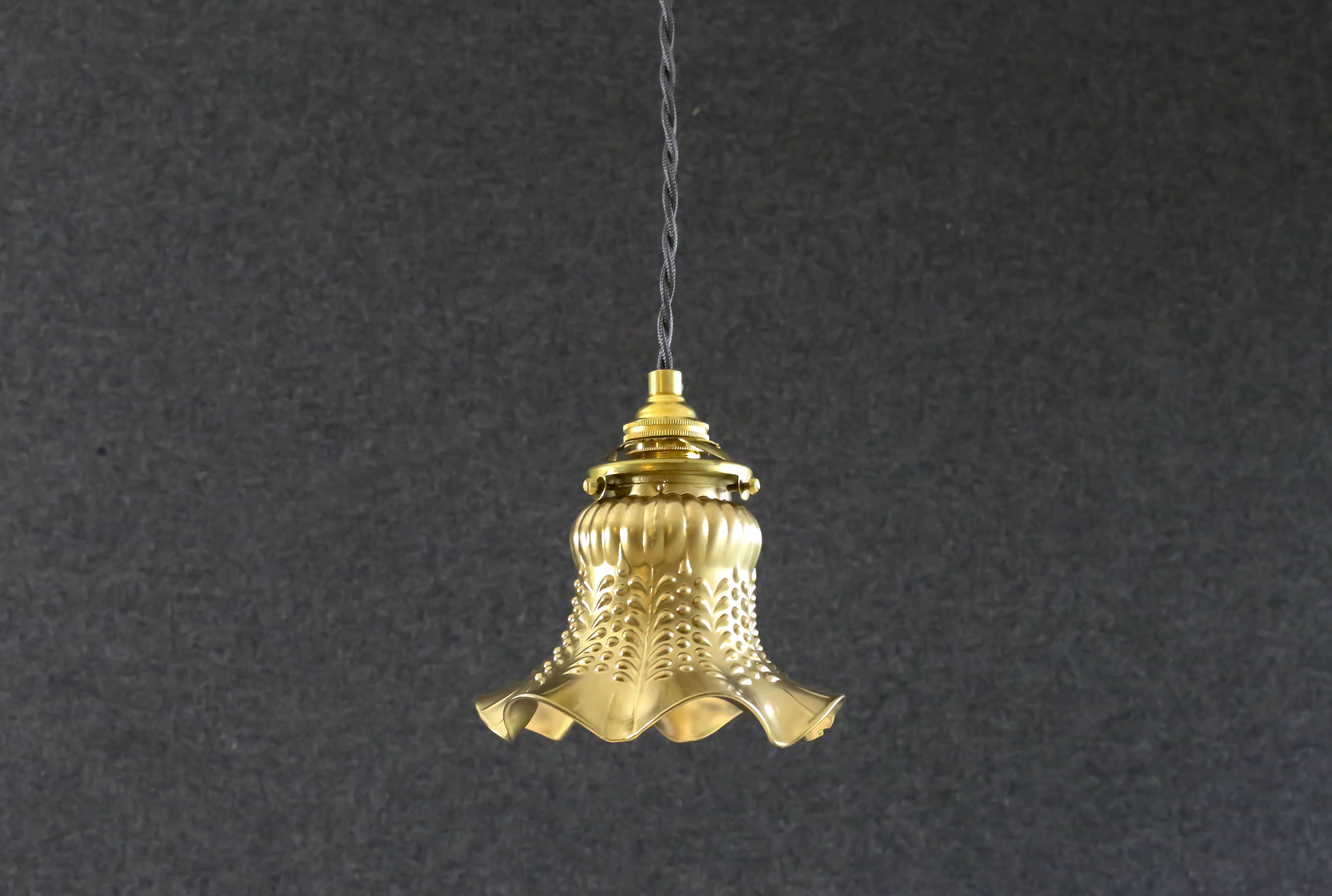 Old tulip suspension painted gold with new brass