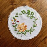 Small white placemat embroidered in colored thread, vintage
