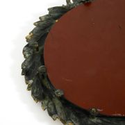 Beautiful small French mid-century wall mirror with an ornate brass frame