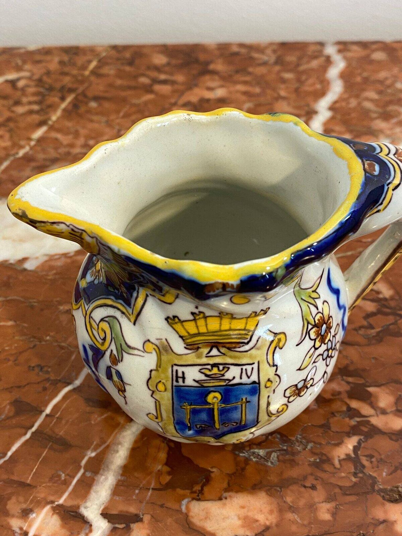 Small antique jug in faience from Les Sables d'Olonne, hand-painted.