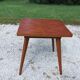 Extendable table with compass legs