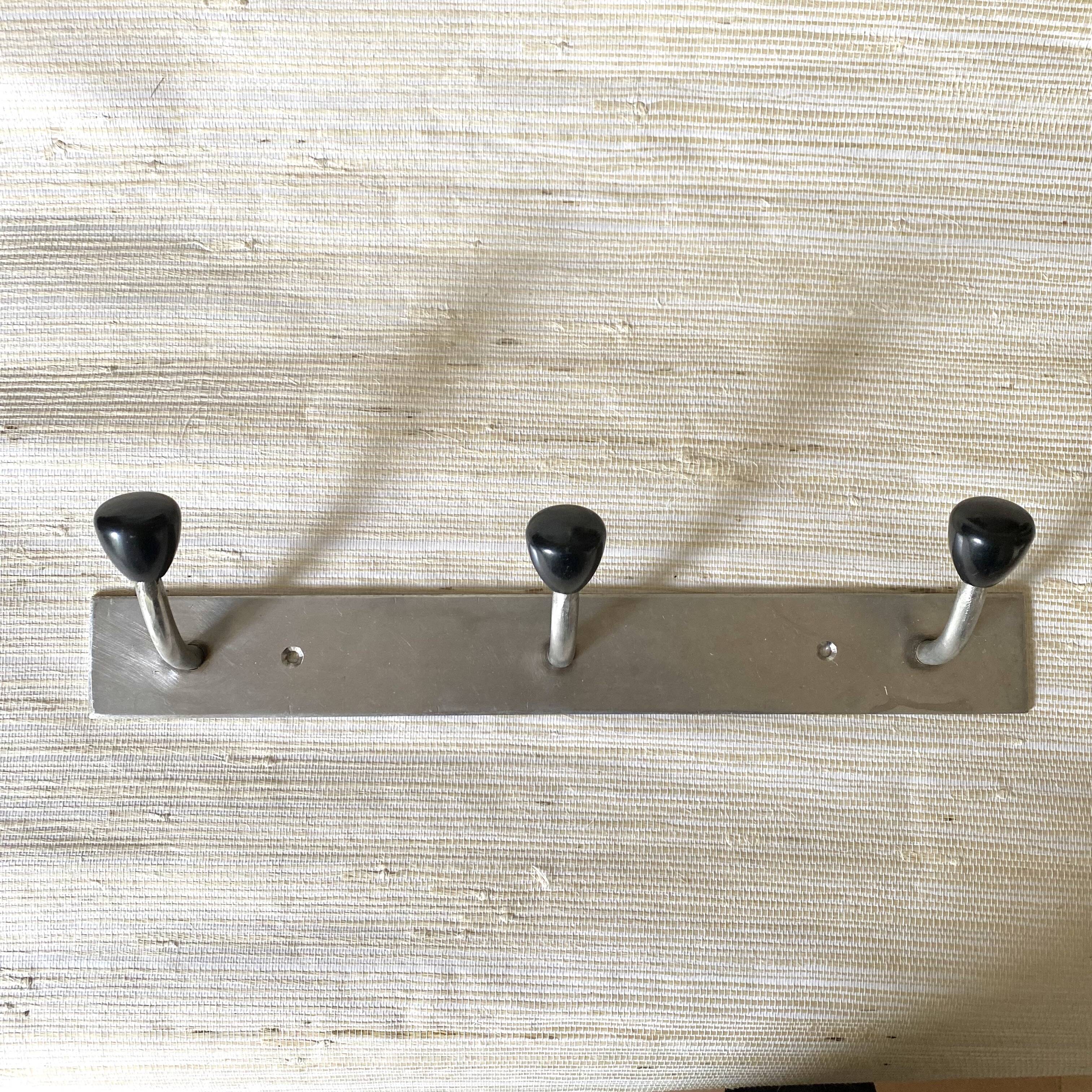 Industrial wall coat rack, 50s