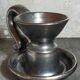 1950s iridescent black ceramic hand candle holder