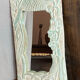 Carved wooden mirror
