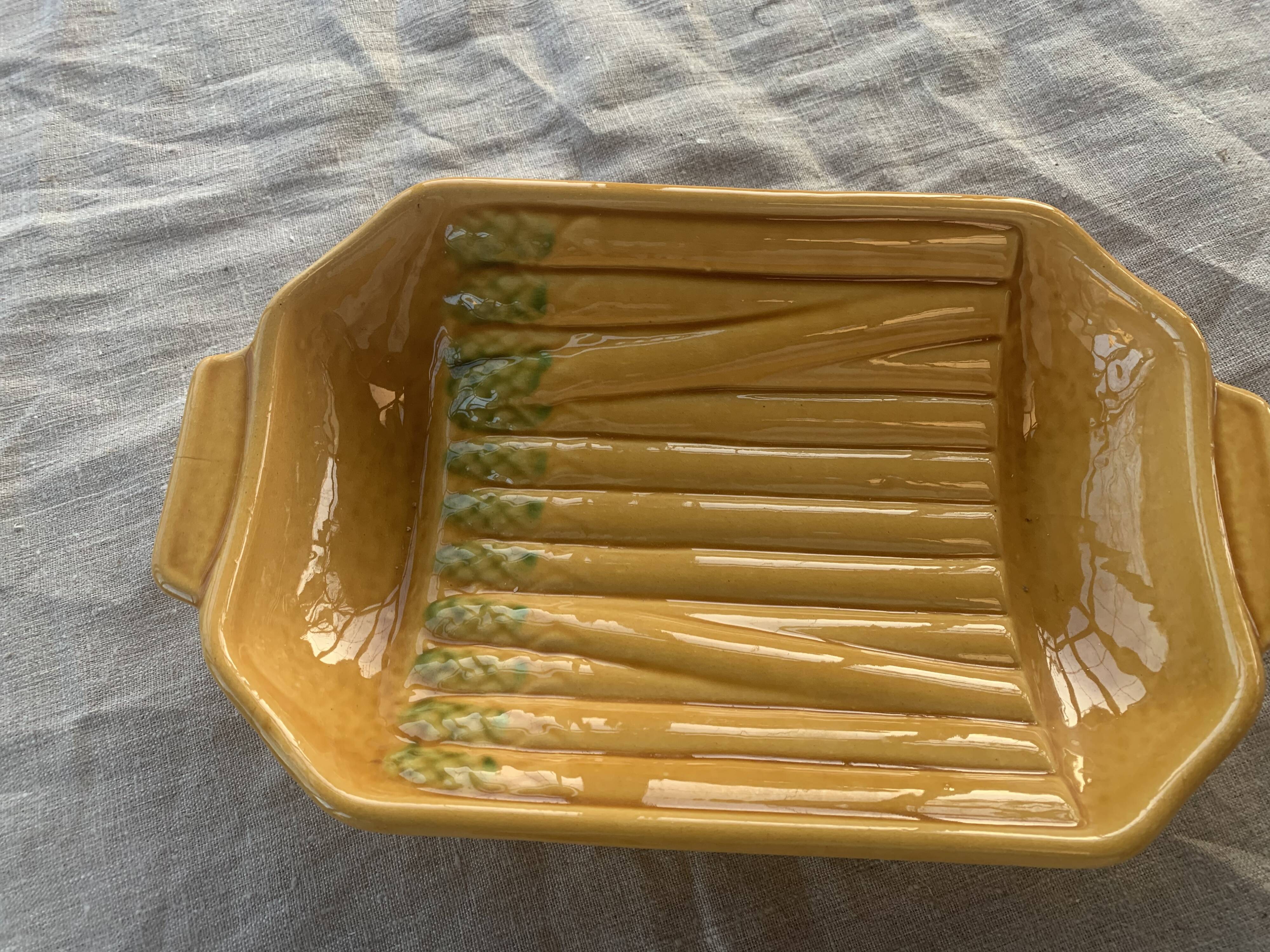 Vintage slip glazed ceramic asparagus dish