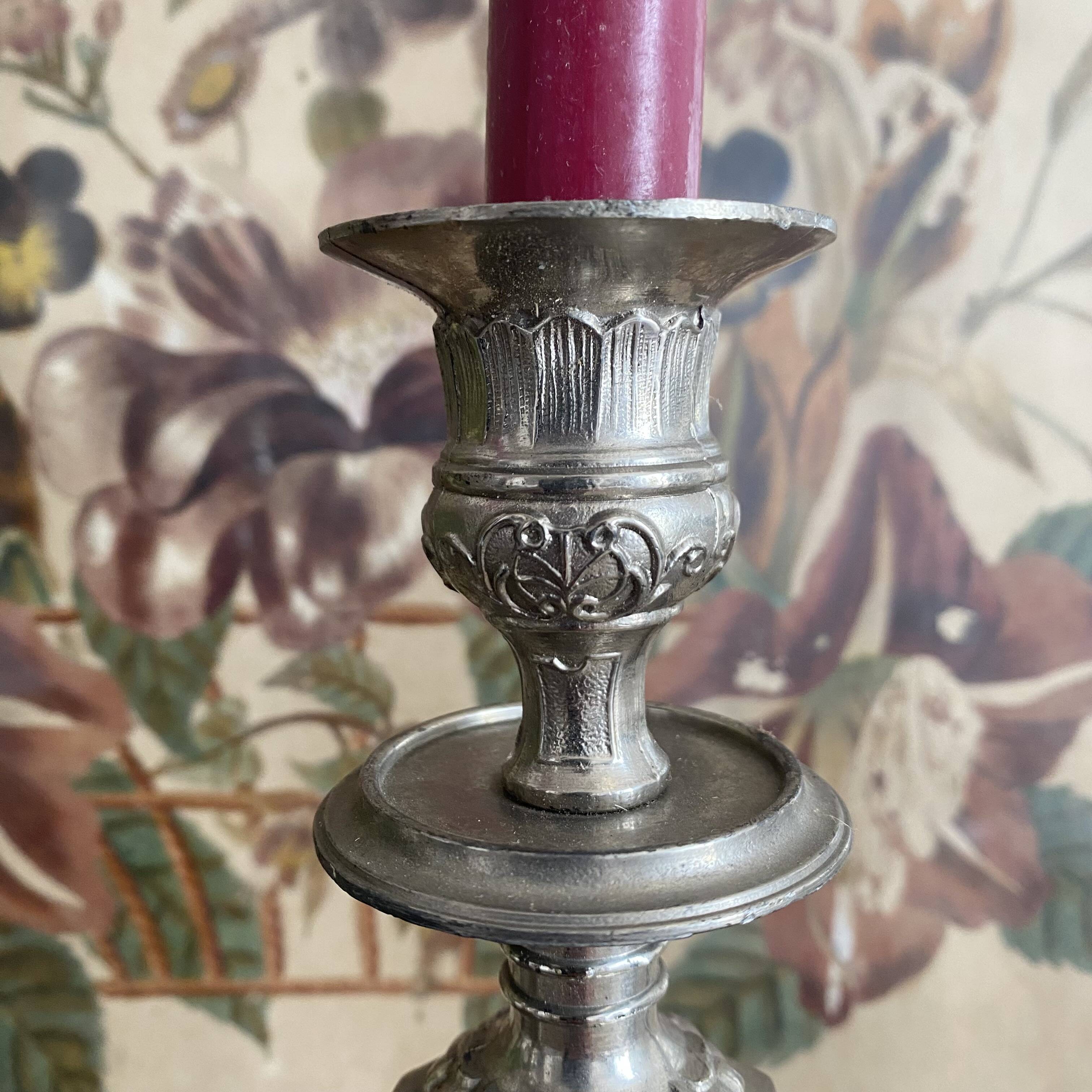 Antique silver-plated metal candlesticks