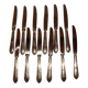 12 stainless steel table knives M.A. in "Louis XV" style, hunting horn model.