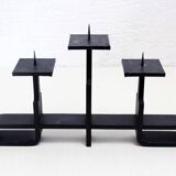 Modernist cast iron candle holder
