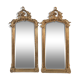 Pair of Louis XV style mirrors, stuccoed and gilded wood, beveled mirrors